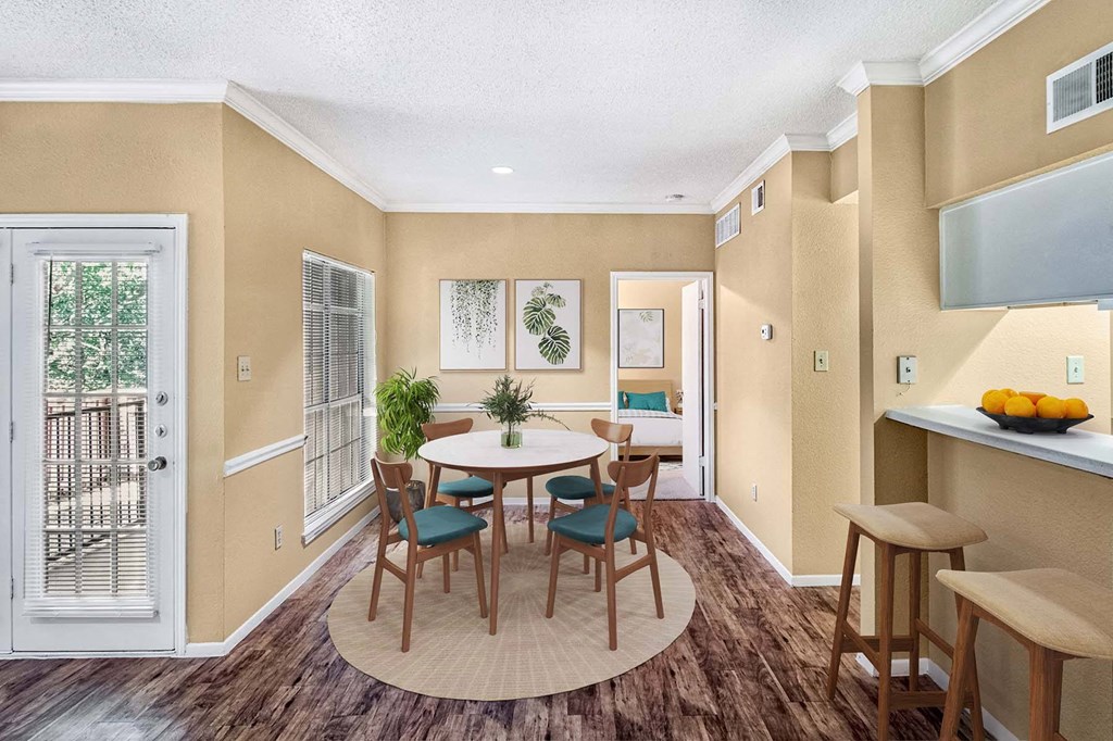 a dining room with a table and chairs Dining Room at Channings Mark, Austin, 78759